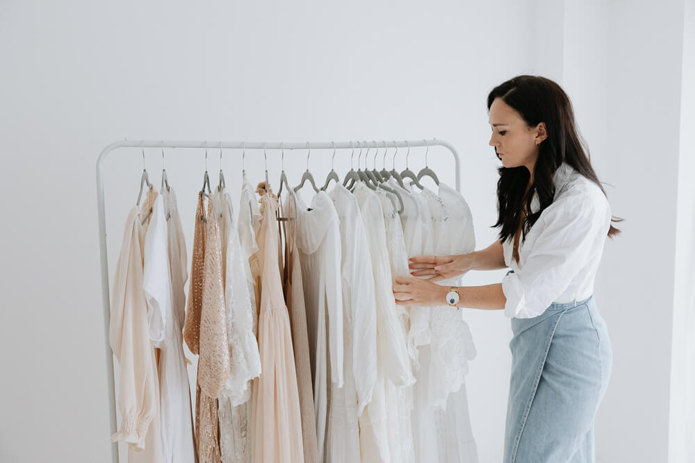 Selecting maternity dress- photographed by Natasha Cranley