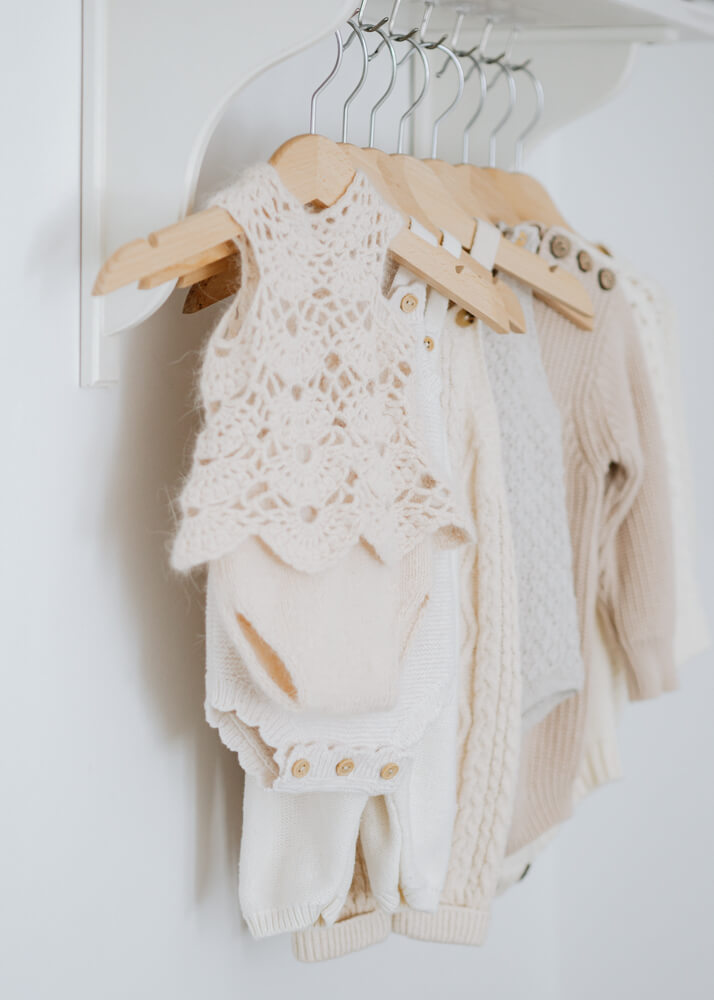 Newborn clothes wardrobe - photographed by Natasha Cranley